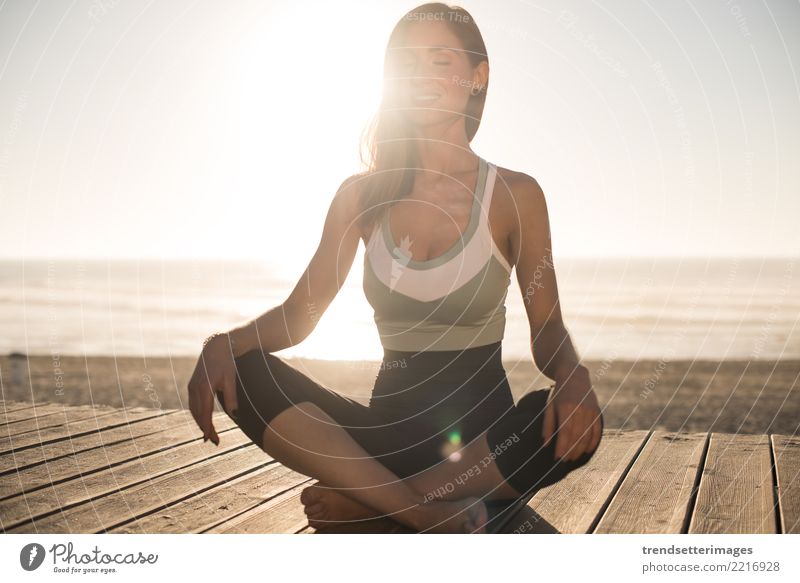 Women having a time meditating on the beach Diet Lifestyle Happy Beautiful Body Wellness Relaxation Meditation Vacation & Travel Summer Beach Ocean Yoga