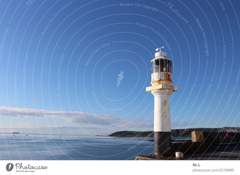 A rusty lighthouse Vacation & Travel Adventure Water Sky Clouds Hill Mountain Coast Ocean Small Town Lighthouse Old Wet Blue Black White Infinity England Rust