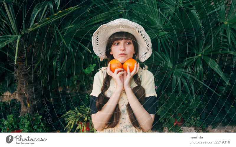 Young woman holding fruit in her hands Lifestyle Style Beautiful Healthy Healthy Eating Human being Feminine Youth (Young adults) 1 18 - 30 years Adults Nature