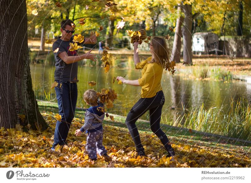 Family playing with leaves in the fall Human being Masculine Feminine Child Boy (child) Family & Relations Couple 3 1 - 3 years Toddler 18 - 30 years