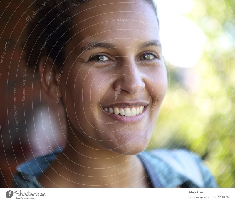 Close portrait of beautiful young woman with green eyes smiling at camera Elegant Joy pretty Contentment Young woman Youth (Young adults) Face Eyes