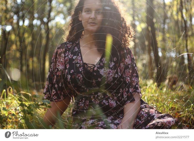 Portrait of tall beautiful woman with long dark curly hair in forest pretty Wellness Well-being Young woman Youth (Young adults) 18 - 30 years Adults Nature