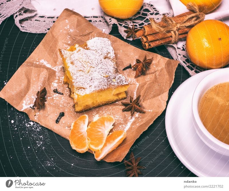 piece of mandarin cake Food Fruit Cake Dessert Nutrition Vegetarian diet Beverage Coffee Mug Table Wood Eating Delicious Natural Brown Yellow Black White