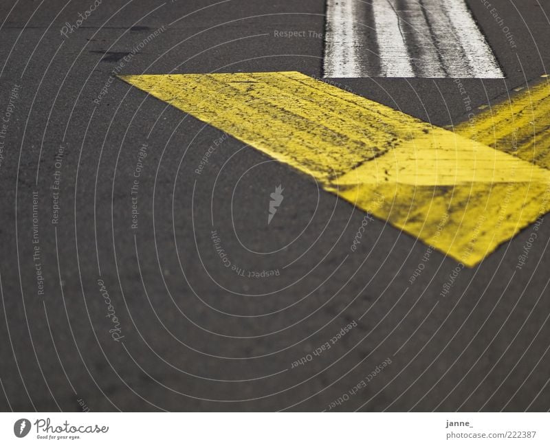 groundbreaking Street Sign Arrow Asphalt Yellow Gray White Colour photo Exterior shot Deserted Day Light Copy Space left Copy Space bottom Lane markings Tar