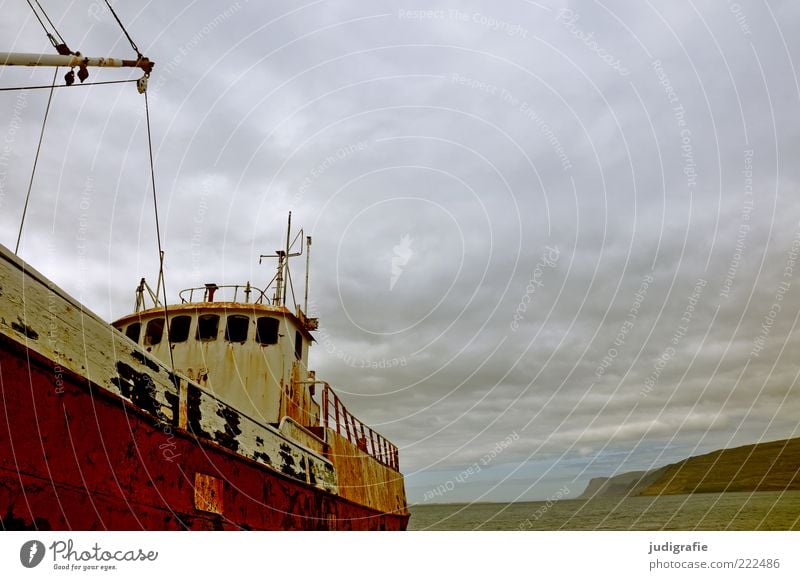 Iceland Environment Nature Landscape Sky Clouds Rock Mountain Fjord Navigation Boating trip Passenger ship Fishing boat Old Exceptional Dark Cold Natural Wild