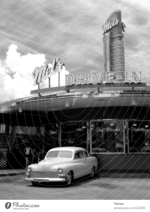 drive in USA Americas Vintage car Motor vehicle Parking lot Architecture Sky Clouds Vacation & Travel Past Gastronomy Car Fast food restaurant Exterior shot