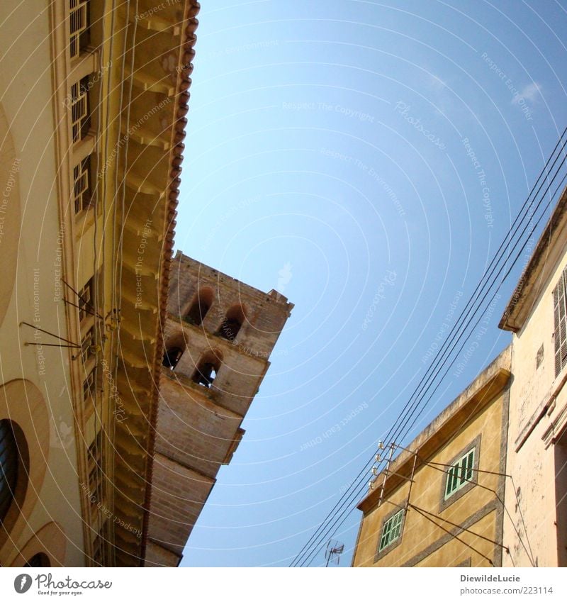 sky blue Summer Sky Beautiful weather Small Town Downtown House (Residential Structure) Church Wall (barrier) Wall (building) Facade Window Roof To enjoy Old