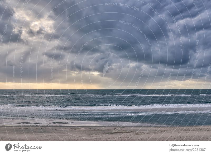 Dramatic seascape against cloudy sky at sunset Vacation & Travel Beach Ocean Waves Nature Landscape Sky Clouds Horizon Autumn Weather Storm Wind Coast