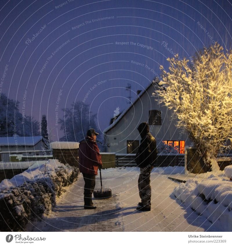 Father shovels snow in the driveway in the evening, son watches Winter Snow Human being Masculine Young man Youth (Young adults) 2 Ice Frost Tree Detached house