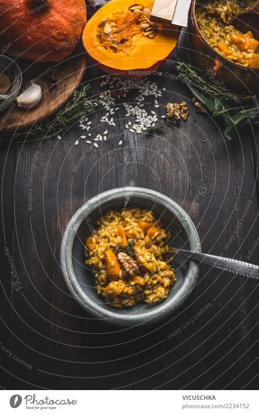 Pumpkin risotto in bowl with spoon and ingredients Food Vegetable Nutrition Lunch Dinner Banquet Organic produce Vegetarian diet Crockery Plate Bowl Hallowe'en