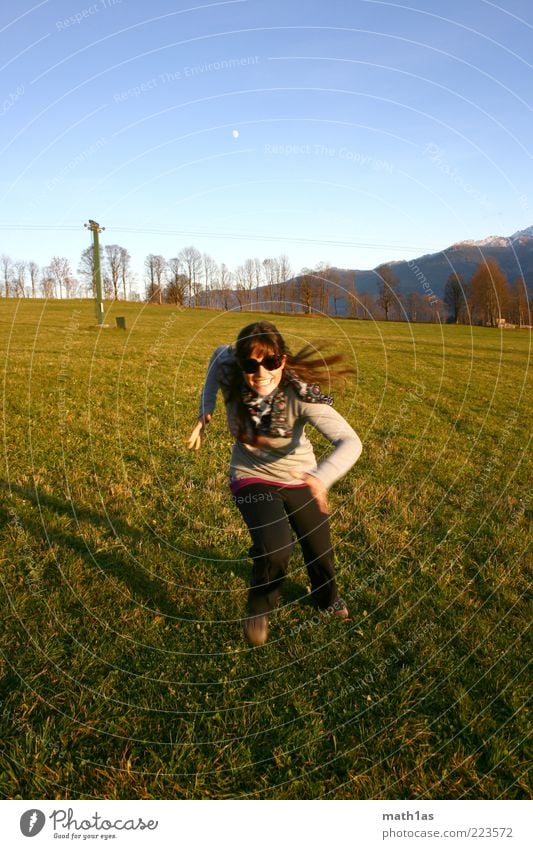 anticipation Joy Happy Human being Young woman Youth (Young adults) 1 Laughter Walking Colour photo Exterior shot Copy Space top Evening Long shot Full-length