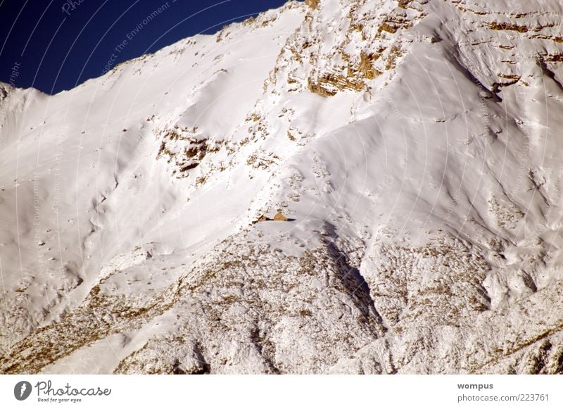 Beginning of winter in the high mountains Landscape Beautiful weather Snow Rock Alps Mountain Colour photo Exterior shot Deserted Day Long shot Slope