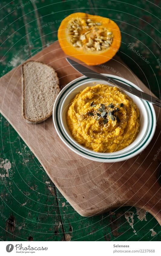 pumpkin season Pumpkin Spread Eating Nutrition vegan Vegetarian diet Knives Bread Food Organic produce Vegetable Healthy Eating Colour photo Vegan diet