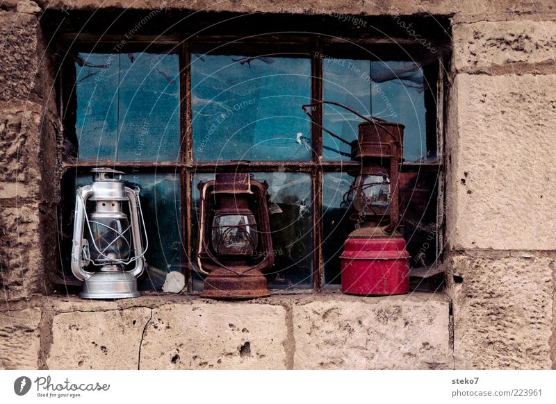 3 lamps from a windowsill Wall (barrier) Wall (building) Window Old Oil lamp Red Silver Stone wall Scrap metal Multicoloured Exterior shot Deserted