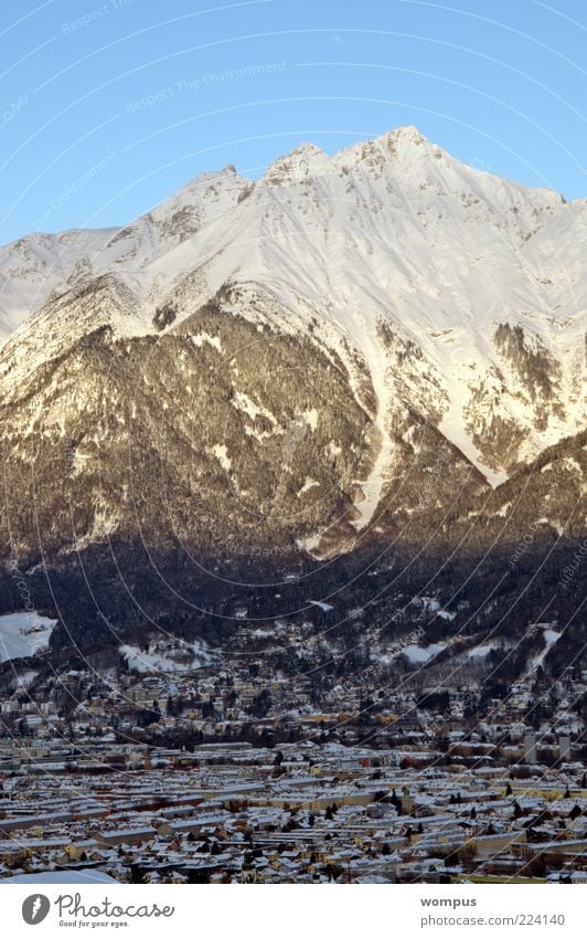 Innsbruck Environment Nature Landscape Beautiful weather Rock Alps Mountain Peak Snowcapped peak Blue Brown Yellow Gray White Colour photo Exterior shot Day