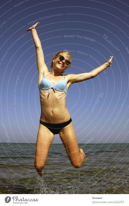 joyful leap Joy Happy Life Freedom Summer Summer vacation Ocean Feminine 1 Human being Water Cloudless sky Beautiful weather Bikini Sunglasses Blonde Flying