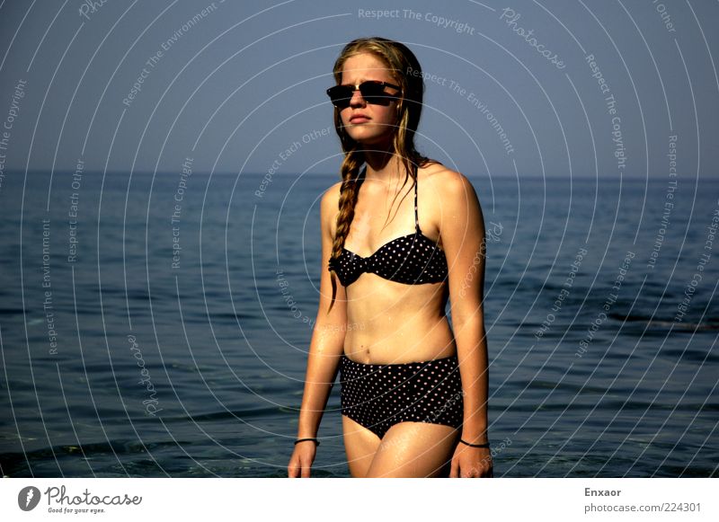 Looking into the sun Beautiful Body Hair and hairstyles Skin Harmonious Contentment Summer Ocean Feminine Water Bikini Sunglasses Blonde Braids Relaxation Thin