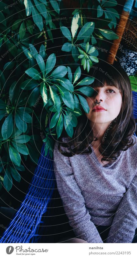 Young brunette woman next to a plant at home Lifestyle Style Design Living or residing Human being Feminine Young woman Youth (Young adults) 1 18 - 30 years