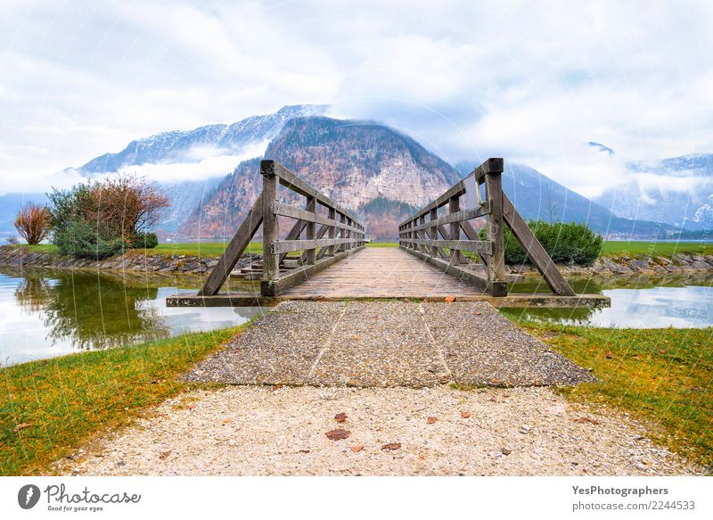 Wooden bridge leading to mountains Calm Vacation & Travel Tourism Island Mountain Nature Beautiful weather Alps Lakeside Joie de vivre (Vitality) Optimism