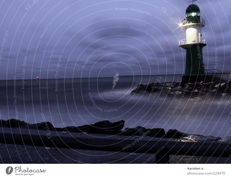 light signals Water Winter Weather Coast Lighthouse Road sign Illuminate Blue Cold Evening Long exposure Cloud cover Wet Signal Colour photo Exterior shot