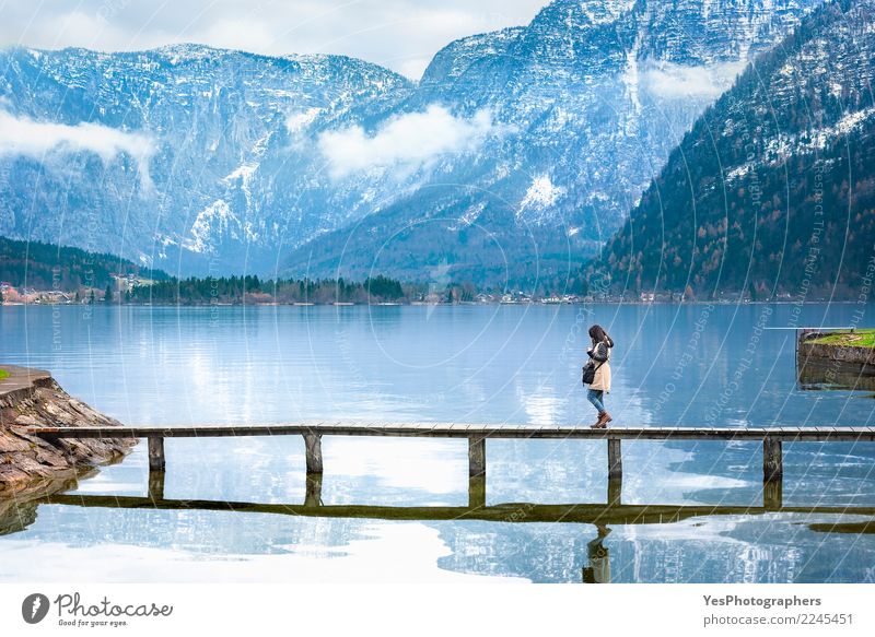 Girl walking on a deck over an alpine lake Vacation & Travel Tourism Freedom Mountain Human being Feminine Young woman Youth (Young adults) Woman Adults 1