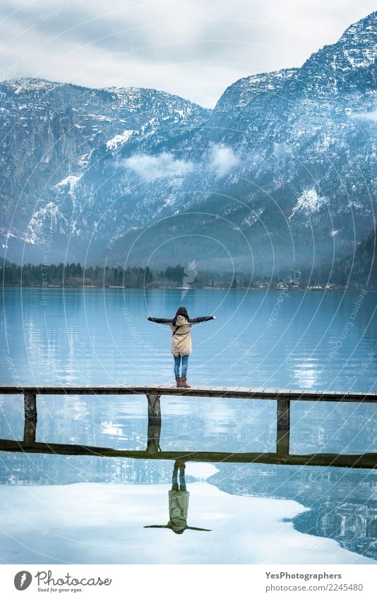 Woman on a bridge enjoying the view Vacation & Travel Tourism Freedom Mountain Human being Feminine Young woman Youth (Young adults) Adults 1 Nature Lake Bridge