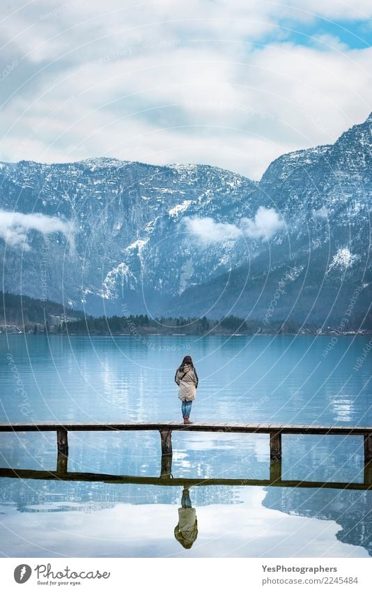 Woman on bridge in alpine scenery Vacation & Travel Tourism Freedom Mountain Human being Young woman Youth (Young adults) Adults 1 Nature Lake Bridge Think