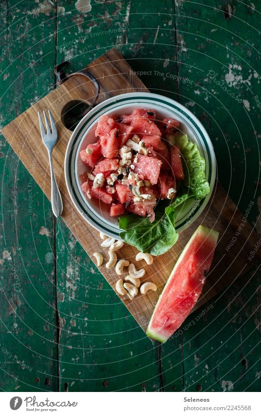 Summer on the table Food Fruit Nut cashews Water melon Salad leaf feta Nutrition Eating Organic produce Vegetarian diet Diet Fasting Bowl Fork Fresh Healthy