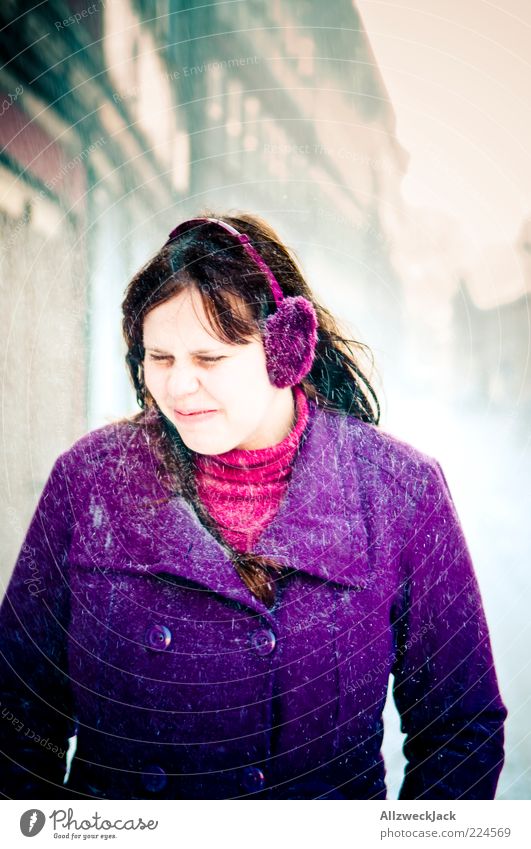 Purple against the snow Feminine Young woman Youth (Young adults) 1 Human being 18 - 30 years Adults Coat Ear protectors Brunette Long-haired Violet Unwavering