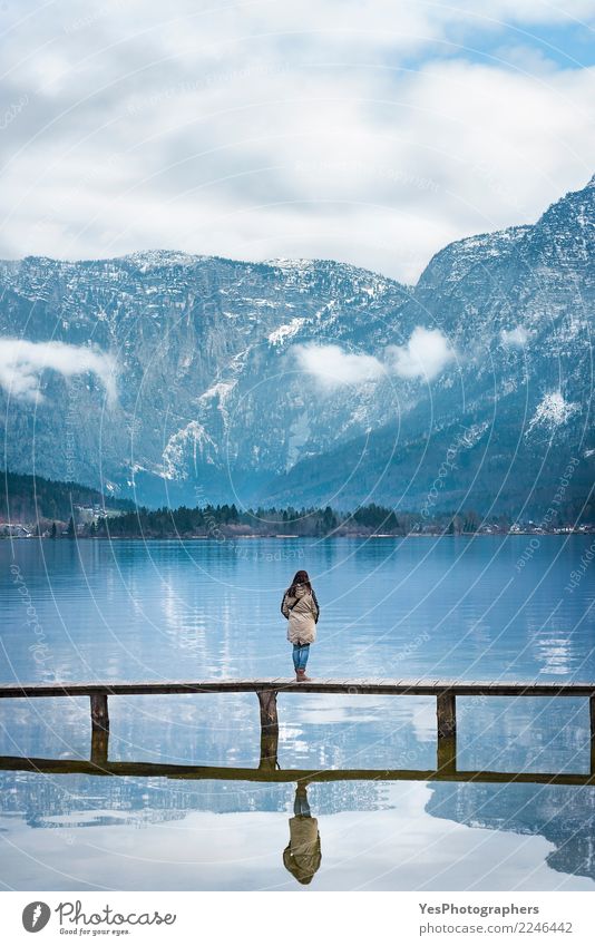 Woman on a bridge enjoying the view Vacation & Travel Tourism Freedom Mountain Human being Young woman Youth (Young adults) Adults 1 Nature Lake Bridge Think