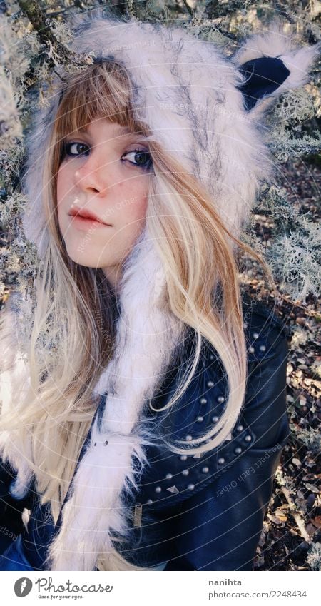 Young blonde woman wearing a fur hat Style Exotic Beautiful Human being Feminine Young woman Youth (Young adults) 1 18 - 30 years Adults Air Winter Clothing