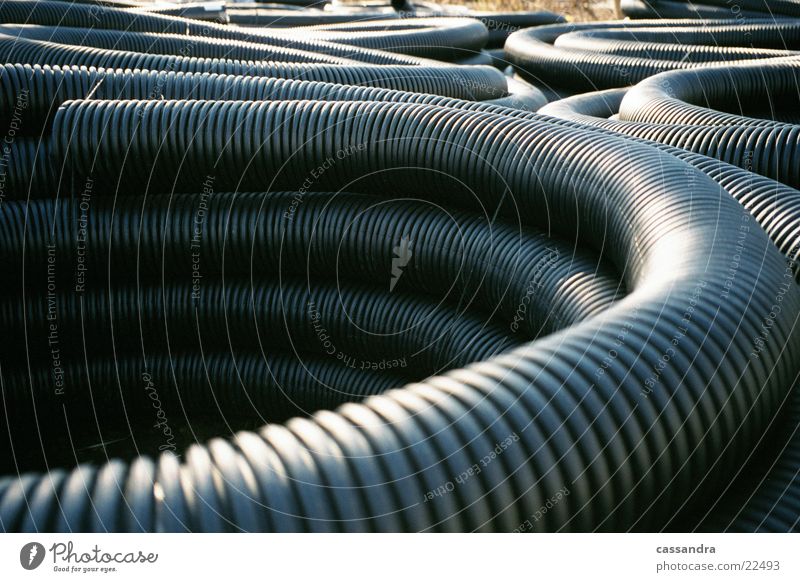 stack of hoses Hose Heap Obscure Construction site Storage Corner