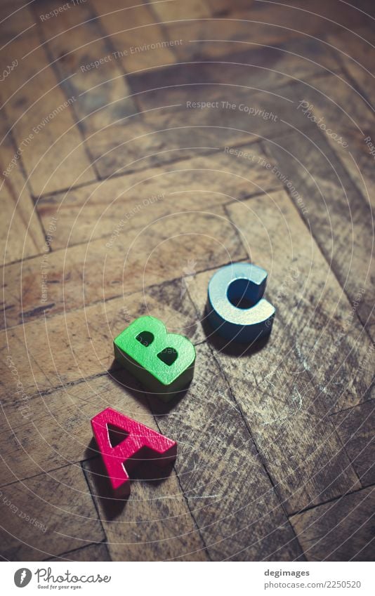 Colorful wooden cubes Playing Child School Classroom Baby Infancy Hand Toys Wood White Colour alphabet blocks a b c letter abc letters isolated background