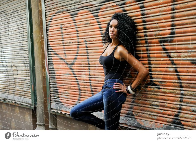 Young black woman against a urban blind Lifestyle Beautiful Body Hair and hairstyles Human being Feminine Young woman Youth (Young adults) Woman Adults 1