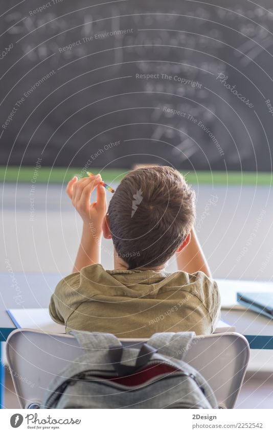 Child attending to the lesson on the blackboard School Study Classroom Blackboard Teacher Academic studies Examinations and Tests Human being Boy (child) Man