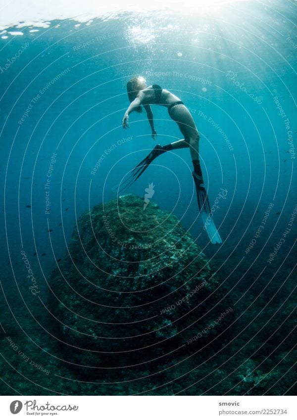 Young woman doing free-diving in the clear water of the Mediterranean Sea Body Skin Senses Relaxation Calm Meditation Swimming & Bathing Vacation & Travel