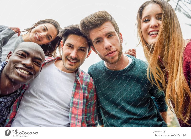 Multiracial group of friends taking selfie in a urban park Lifestyle Joy Happy Beautiful Leisure and hobbies Vacation & Travel Telephone PDA Camera Technology