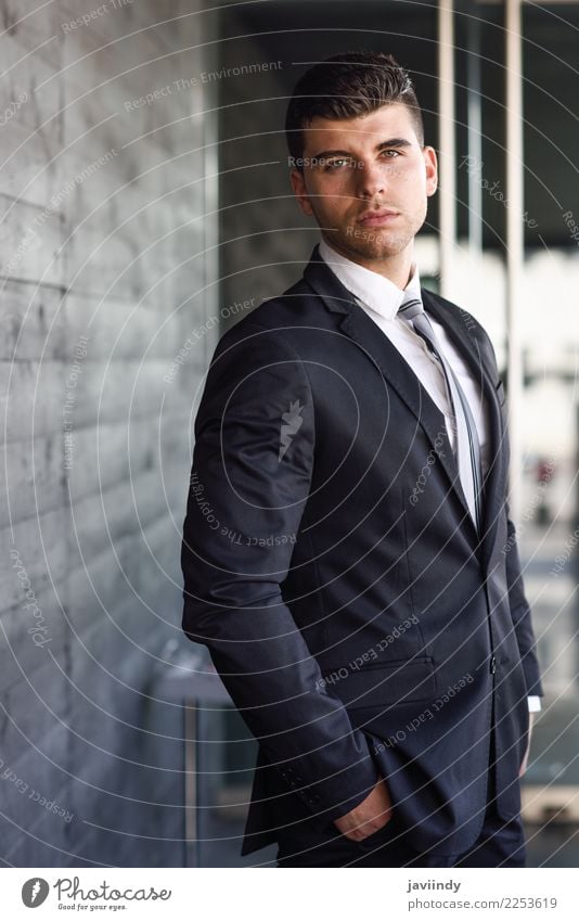 Young businessman near a modern office building Beautiful Hair and hairstyles Profession Office Business Human being Masculine Young man Youth (Young adults)