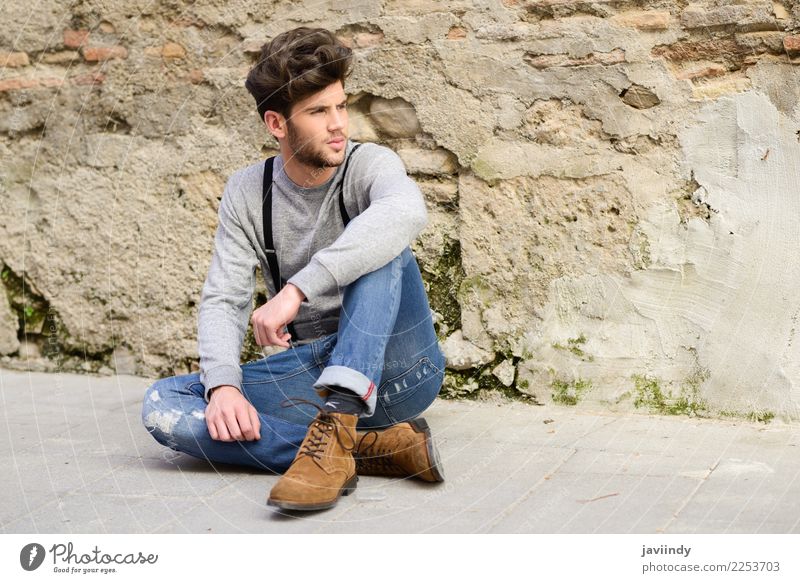 Young man sitting on the floor in urban background Lifestyle Style Hair and hairstyles Summer Human being Masculine Youth (Young adults) Man Adults 1