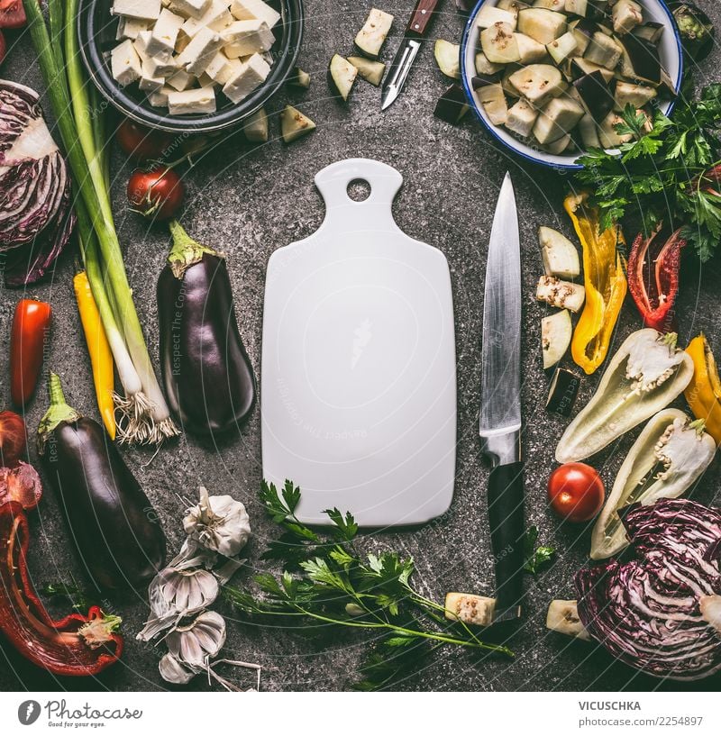 Vegetables on kitchen table with cutting board and knife Food Lettuce Salad Herbs and spices Nutrition Lunch Dinner Organic produce Vegetarian diet Diet