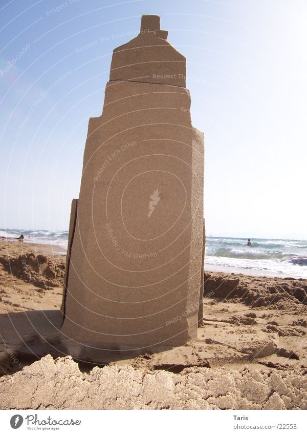 Sandcastle II Wall (building) House (Residential Structure) Ocean Beach Brown Architecture Tall Tower Shadow sand walls Sky