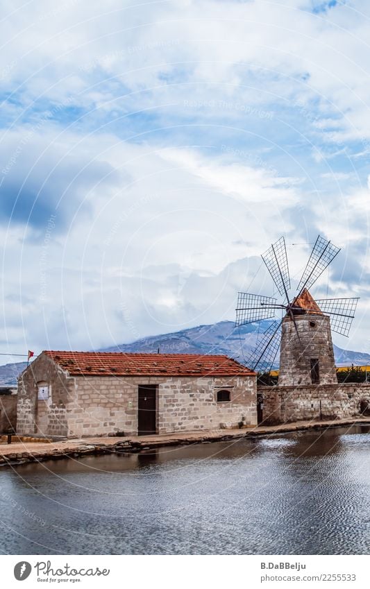 Saline of Trapani, unfortunately the old windmill blades no longer turn at the edge of the saline basins. Italy Sicily vacation Day Deserted Exterior shot