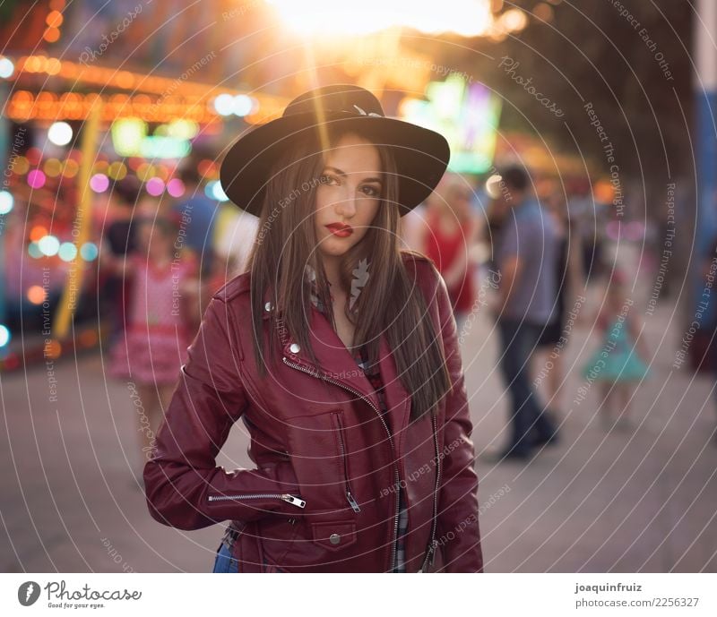 beauty girl with a hat in a fair with many lights Lifestyle Joy Happy Beautiful Entertainment Woman Adults Park Hat Happiness White Carousel Amusement Park