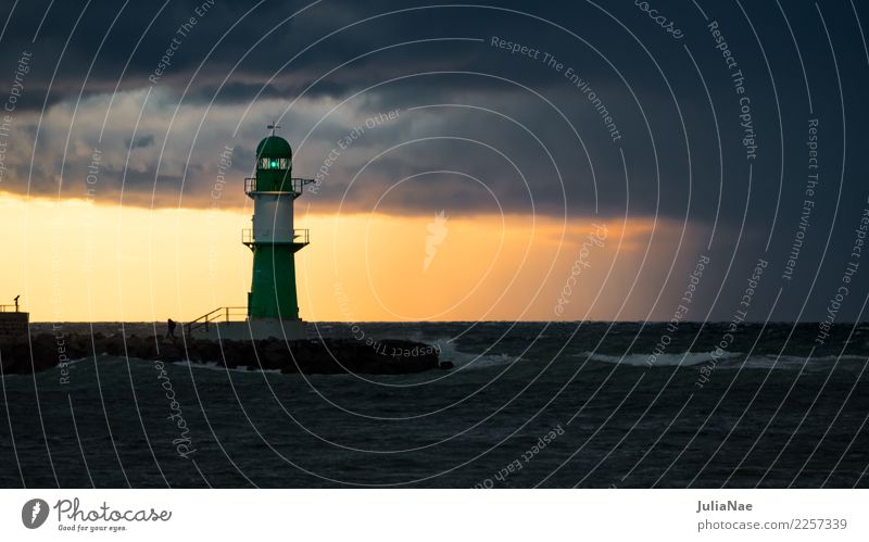 Rostock lighthouse in the rain Baltic Sea Lighthouse Beacon Sunset Rain Thunder and lightning Clouds Dramatic Germany Mecklenburg-Western Pomerania