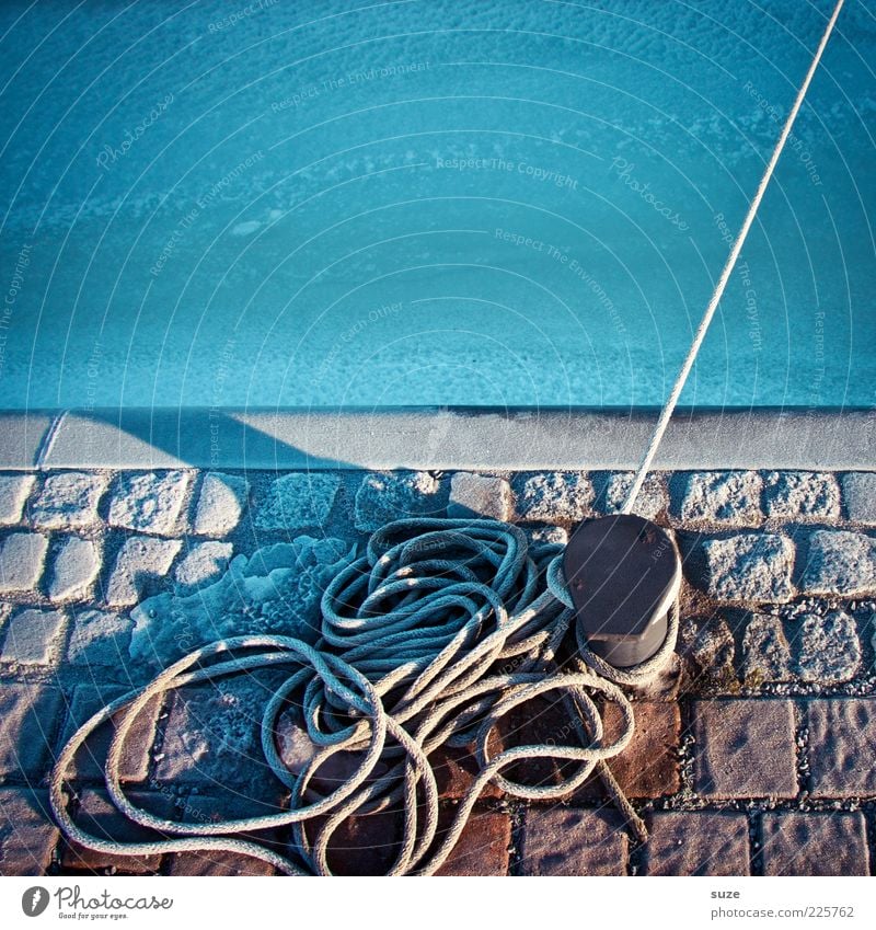 Quay, bollards and dew hold tight Ocean Rope Ice Frost Lakeside Harbour To hold on Cold Blue Bollard Paving stone Cobblestones Jetty Water Attach Colour photo