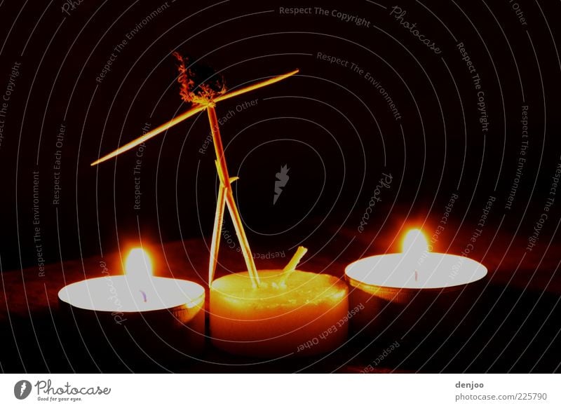 Burning Man Fire Candle Wood Illuminate Whimsical Atmosphere Colour photo Interior shot Experimental Night Shadow Contrast Long exposure Toothpick