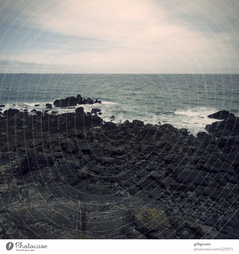 stormy sea Environment Nature Landscape Elements Earth Water Sky Clouds Horizon Climate Bad weather Storm Wind Gale Waves Coast Beach Ocean Island Dark Stone