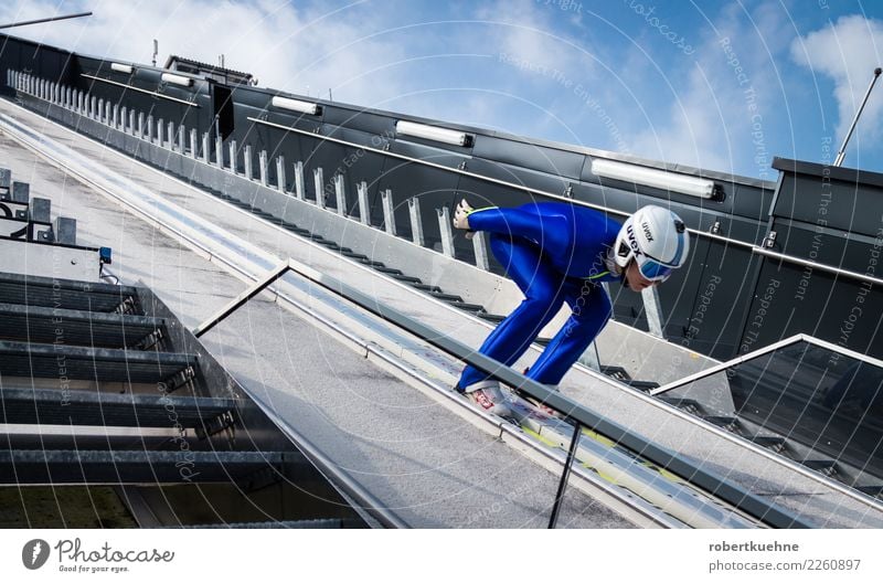 Ski jumper on the ski jump Sports Fitness Sports Training Winter sports Sportsperson Success ski-jump Sporting Complex Human being Man Adults 1 18 - 30 years