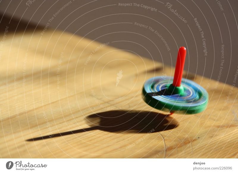 ROTATION Playing Table Kitsch Odds and ends Movement Rotate Speed Colour photo Interior shot Close-up Shadow Deserted Rotation Multicoloured Children's game