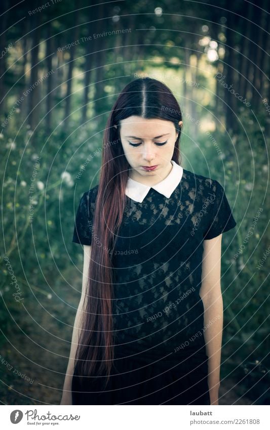 Portrait of a young woman in a melancholic mood, in a forest Exotic Carnival Hallowe'en Young woman Youth (Young adults) 1 Human being 18 - 30 years Adults